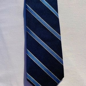 Never worn Brooks Brothers Merchants and Makers series. Blue patterned tie.